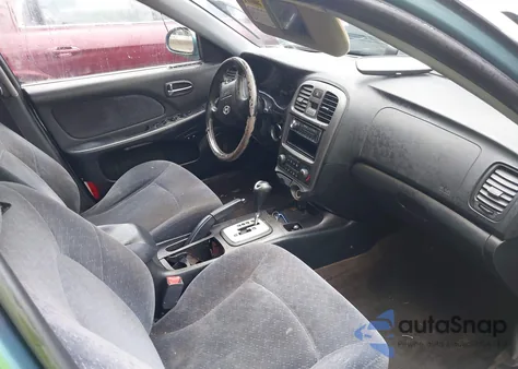 2004 Hyundai Sonata из США, поврежденный, VIN KMHWF25S74A057418